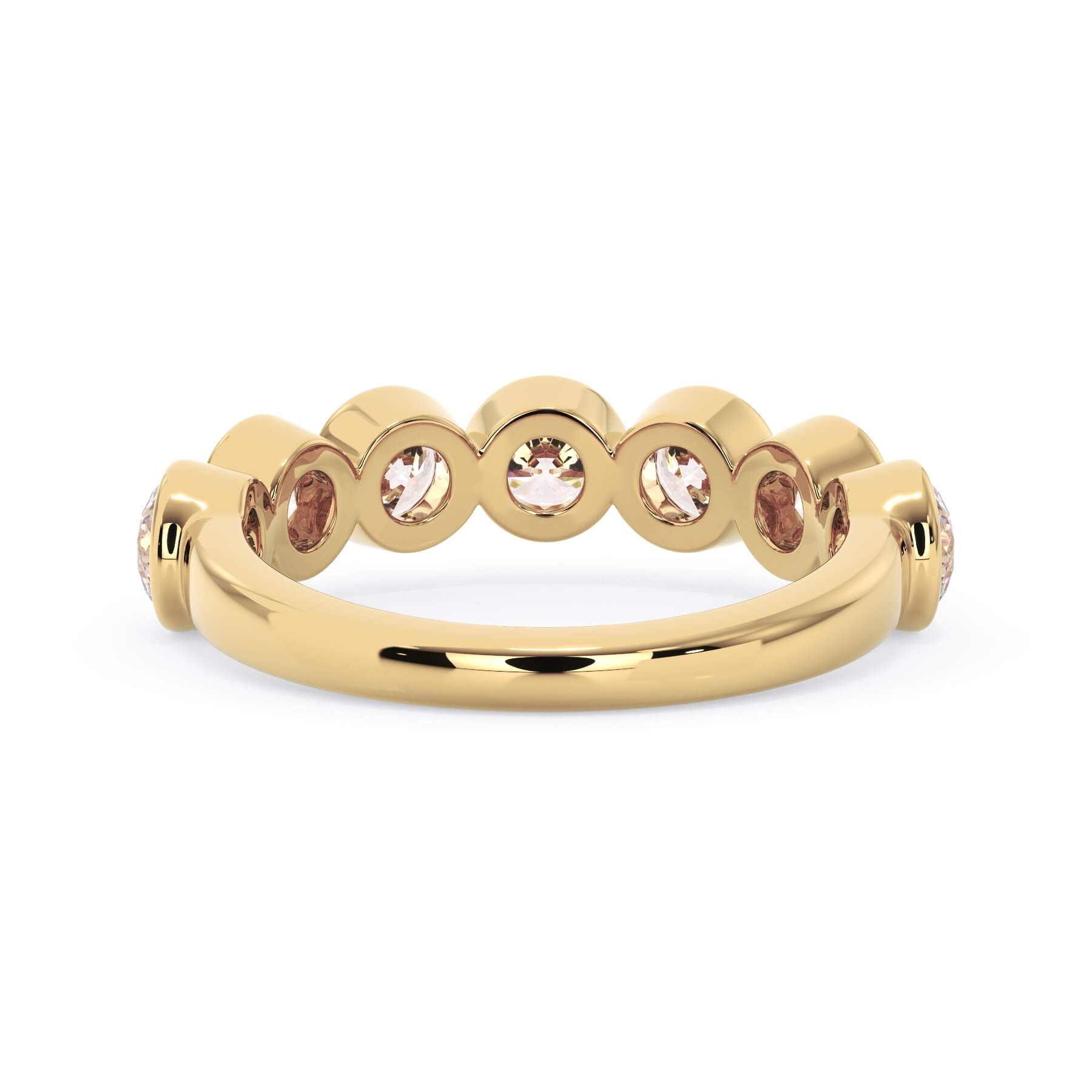 A picture of a seven stone diamond wedding ring with round diamonds that are bezel set in yellow gold on a white background with a view of the underside of the ring.