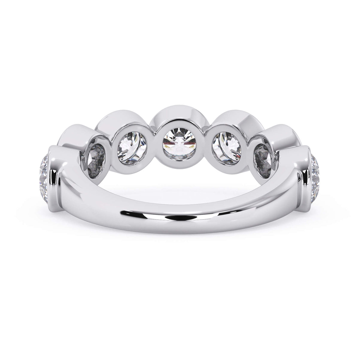 A picture of a seven stone diamond wedding ring with round diamonds that are bezel set in white gold or platinum on a white background with a view of the underside of the ring.