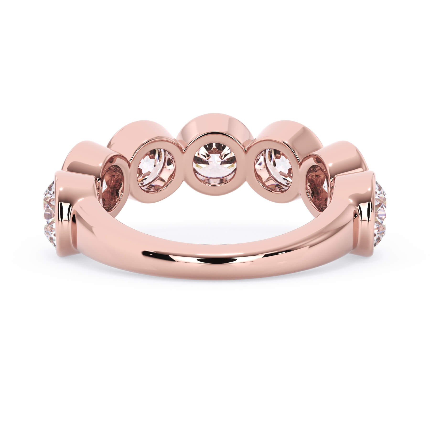 A picture of a seven stone diamond wedding ring with round diamonds that are bezel set in rose gold on a white background with a view of the underside of the ring.