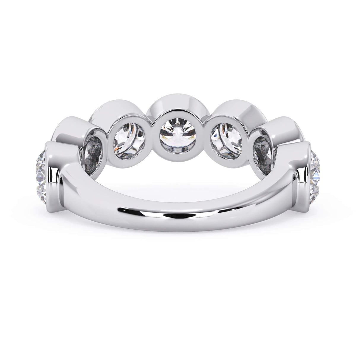 A picture of a seven stone diamond wedding ring with round diamonds that are bezel set in white gold or platinum on a white background with a view of the underside of the ring.