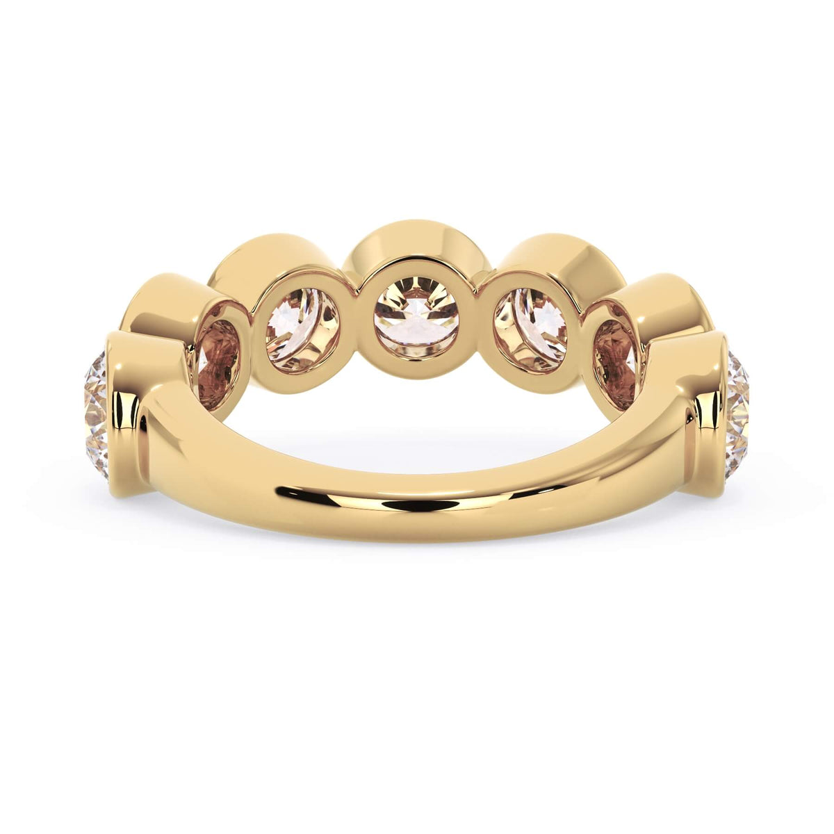 A picture of a seven stone diamond wedding ring with round diamonds that are bezel set in yellow gold on a white background with a view of the underside of the ring.
