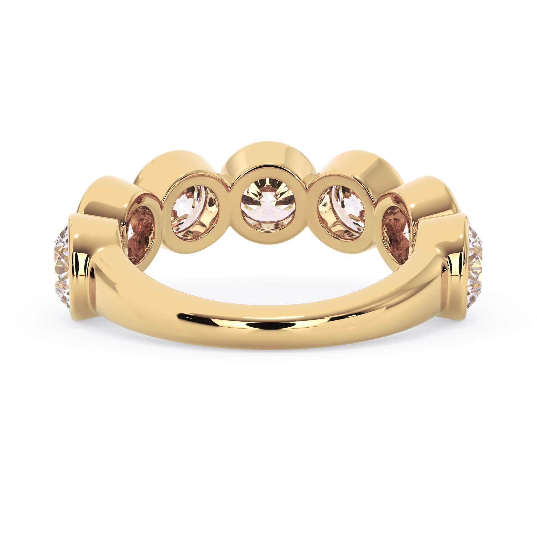 A picture of a seven stone diamond wedding ring with round diamonds that are bezel set in yellow gold on a white background with a view of the underside of the ring.