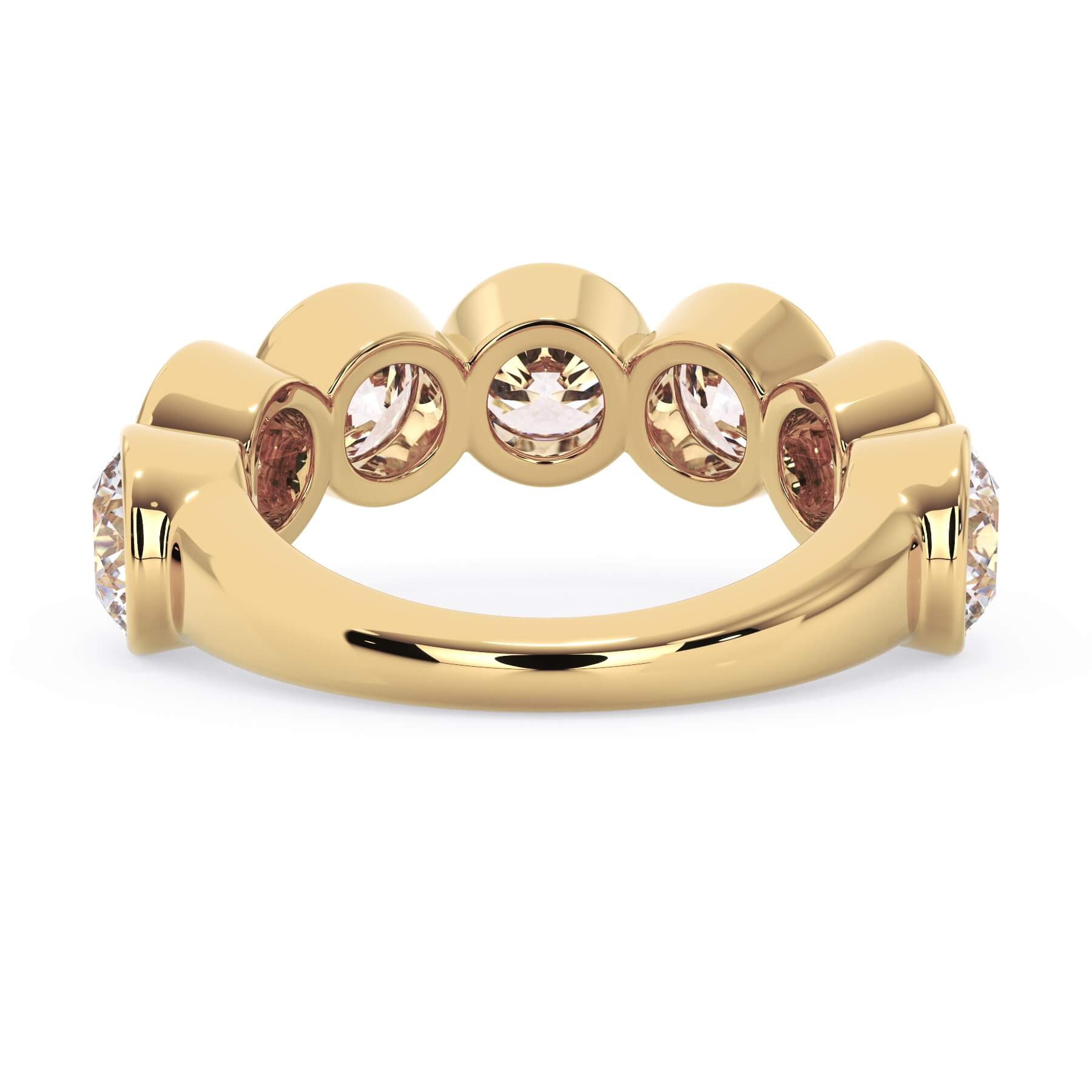 A picture of a seven stone diamond wedding ring with round diamonds that are bezel set in yellow gold on a white background with a view of the underside of the ring.