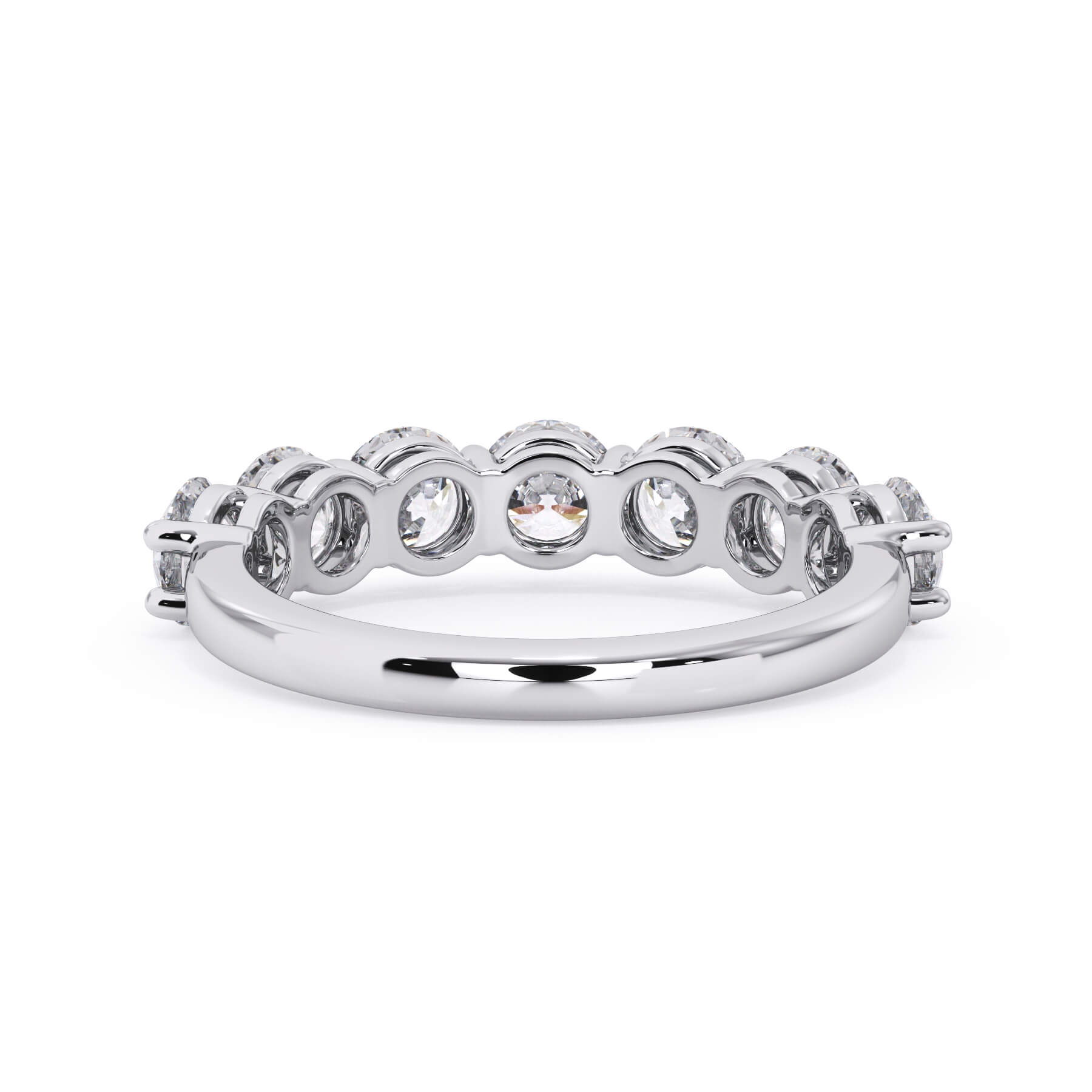 A picture of a seven stone diamond wedding ring with round diamonds that are shared prong set in white gold or platinum on a white background with a view of the underside of the ring.