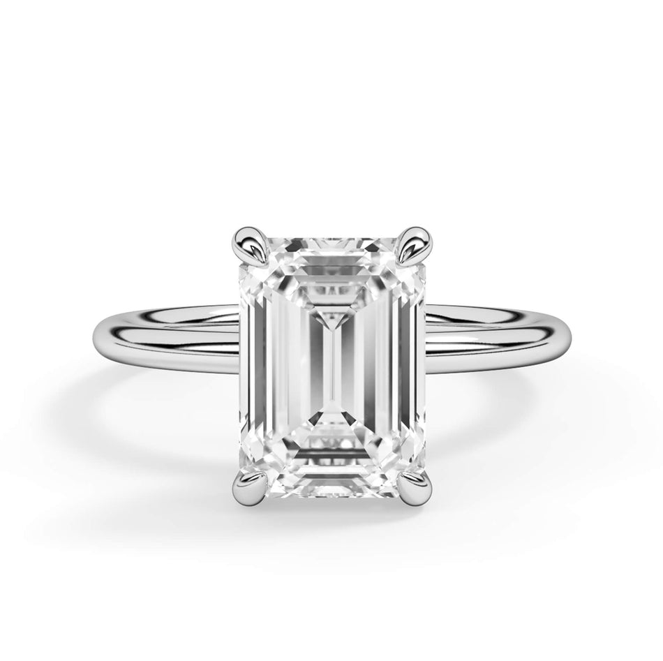 Classic Solitaire Style Engagement Ring with Diamond Basket (SKU: HE100816) Shown with Emerald Shape Diamond in White Gold or Platinum - Front View