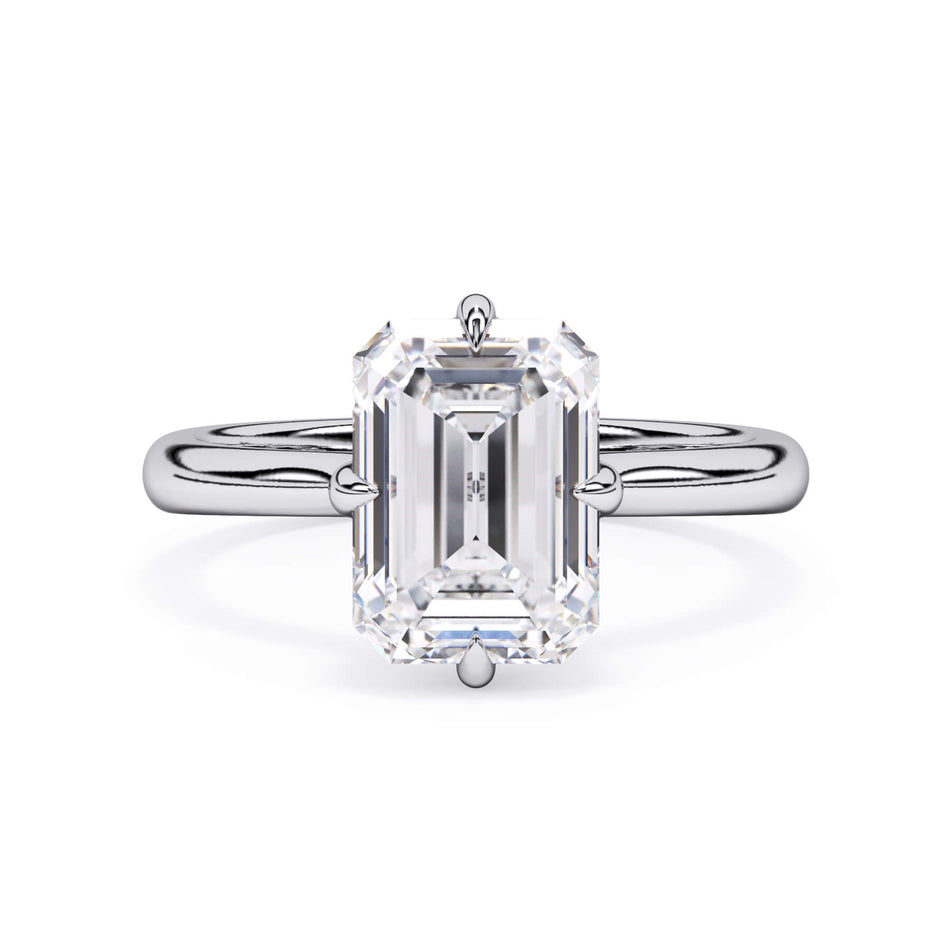 Compass Style Solitaire Engagement Ring (SKU: HE509) Shown with Emerald Shape Diamond in White Gold or Platinum - Front View