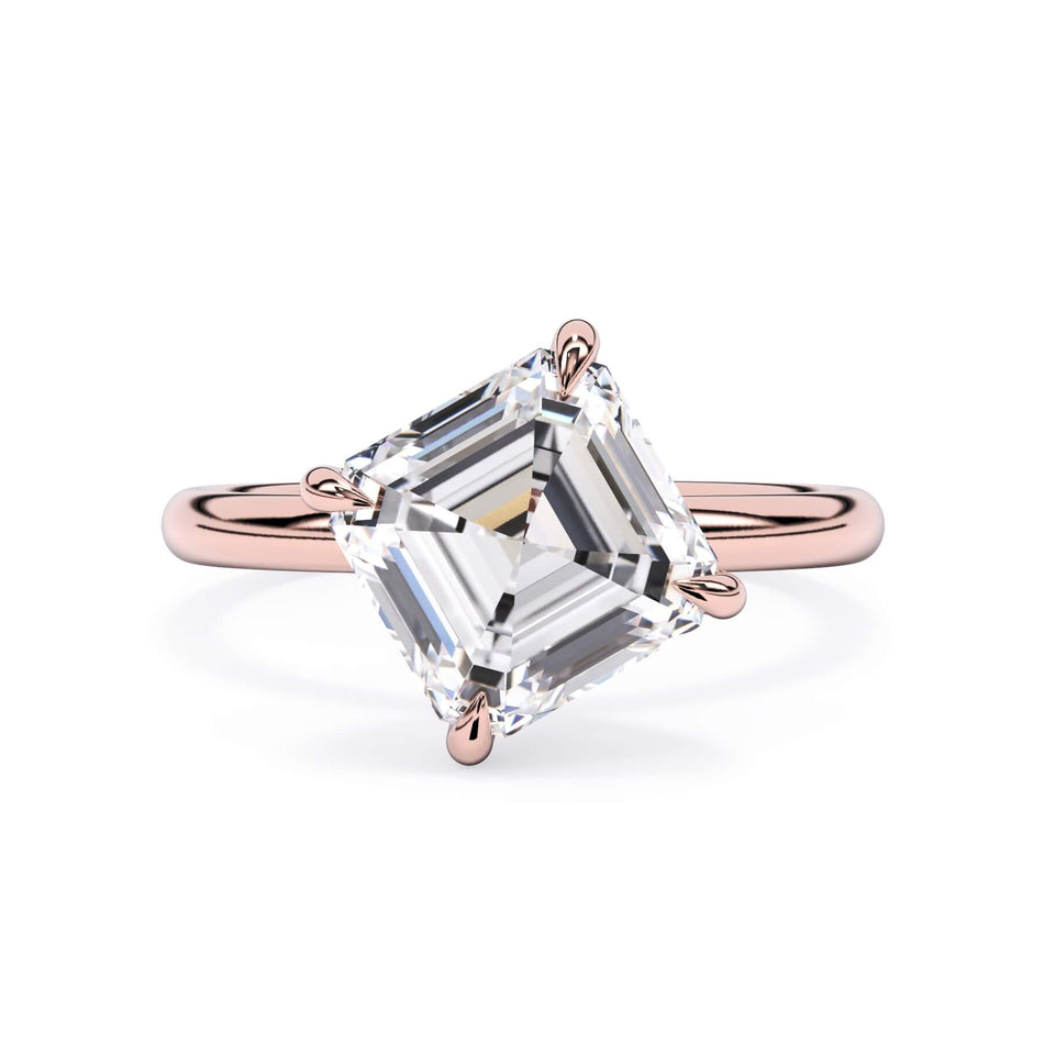 Tilted Head Solitaire Engagement Ring