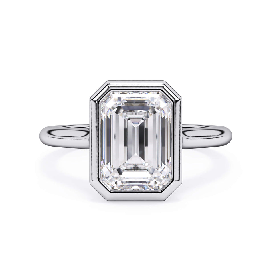 Bezel Solitaire Engagement Ring (SKU: SE-12) Shown with Emerald Shape Diamond in White Gold or Platinum - Front View