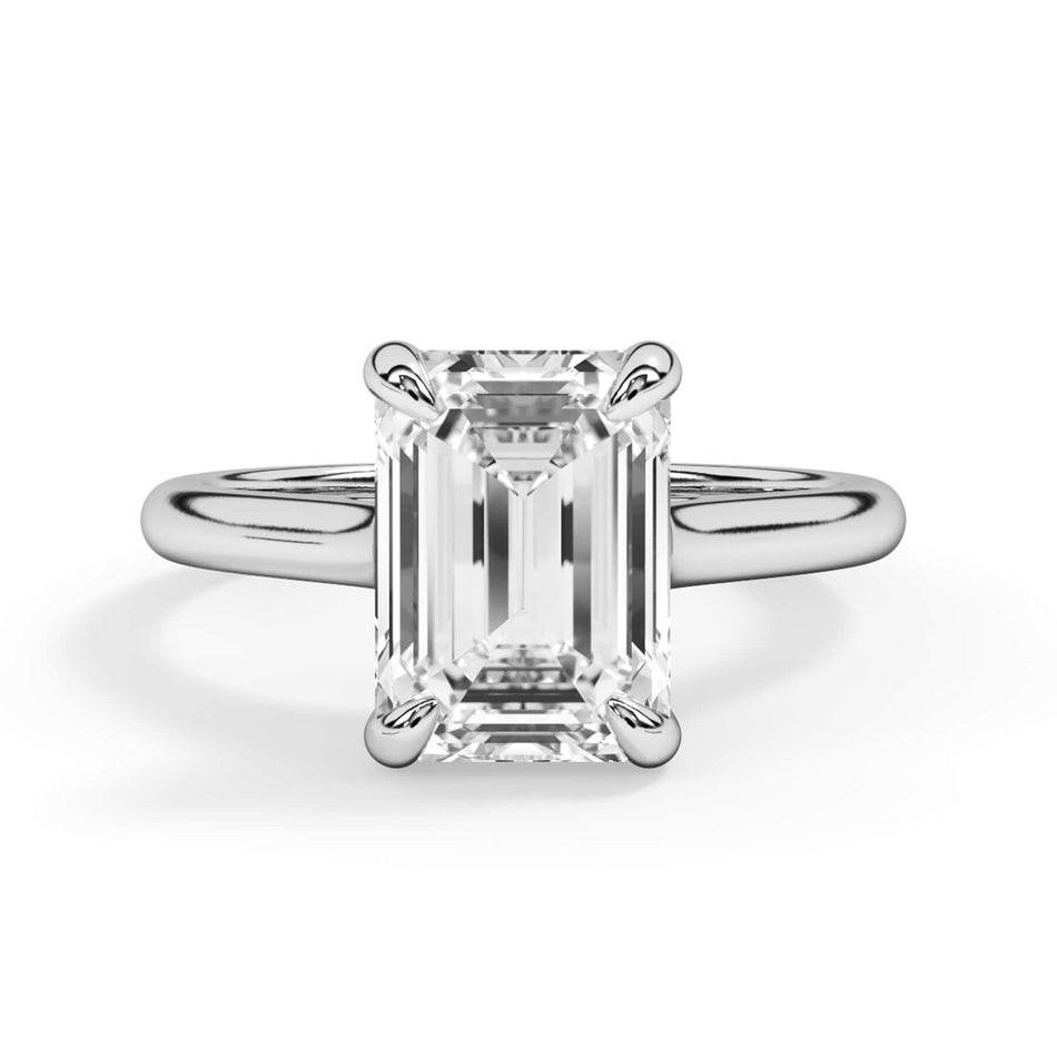 Four Prong Solitaire Engagement Ring Setting (SKU: SE-124171) Shown with Emerald Shape Diamond in White Gold or Platinum - Front View