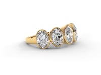 A video of a five stone diamond wedding ring that changes in color from white metal, to yellow, to rose gold on a white background.