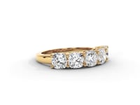 A video of a five stone diamond wedding ring that changes in color from white metal, to yellow, to rose gold on a white background.