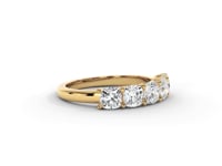 A video of a five stone diamond wedding ring that changes in color from white metal, to yellow, to rose gold on a white background.