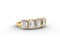 A video of a five stone diamond wedding ring that changes in color from white metal, to yellow, to rose gold on a white background.