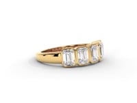 A video of a five stone diamond wedding ring that changes in color from white metal, to yellow, to rose gold on a white background.