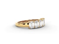 A video of a five stone diamond wedding ring that changes in color from white metal, to yellow, to rose gold on a white background.