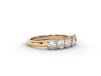 A video of a five stone diamond wedding ring that changes in color from white metal, to yellow, to rose gold on a white background.