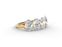 A video of a five stone diamond wedding ring that changes in color from white metal, to yellow, to rose gold on a white background.