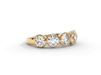 A video of a five stone diamond wedding ring that changes in color from white metal, to yellow, to rose gold on a white background.