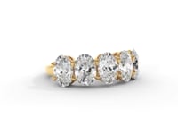 A video of a five stone diamond wedding ring that changes in color from white metal, to yellow, to rose gold on a white background.
