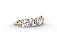 A video of a five stone diamond wedding ring that changes in color from white metal, to yellow, to rose gold on a white background.