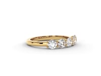 A video of a five stone diamond wedding ring that changes in color from white metal, to yellow, to rose gold on a white background.