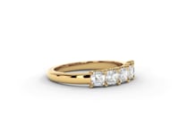 A video of a five stone diamond wedding ring that changes in color from white metal, to yellow, to rose gold on a white background.