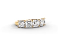 A video of a five stone diamond wedding ring that changes in color from white metal, to yellow, to rose gold on a white background.