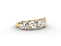 A video of a five stone diamond wedding ring that changes in color from white metal, to yellow, to rose gold on a white background.