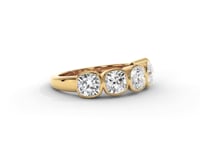 A video of a five stone diamond wedding ring that changes in color from white metal, to yellow, to rose gold on a white background.