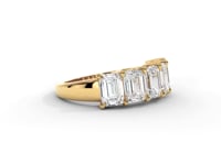 A video of a five stone diamond wedding ring that changes in color from white metal, to yellow, to rose gold on a white background.