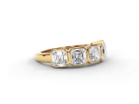 A video of a five stone diamond wedding ring that changes in color from white metal, to yellow, to rose gold on a white background.