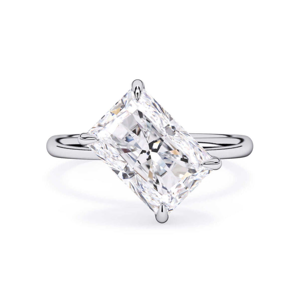 Tilted Head Solitaire Engagement Ring