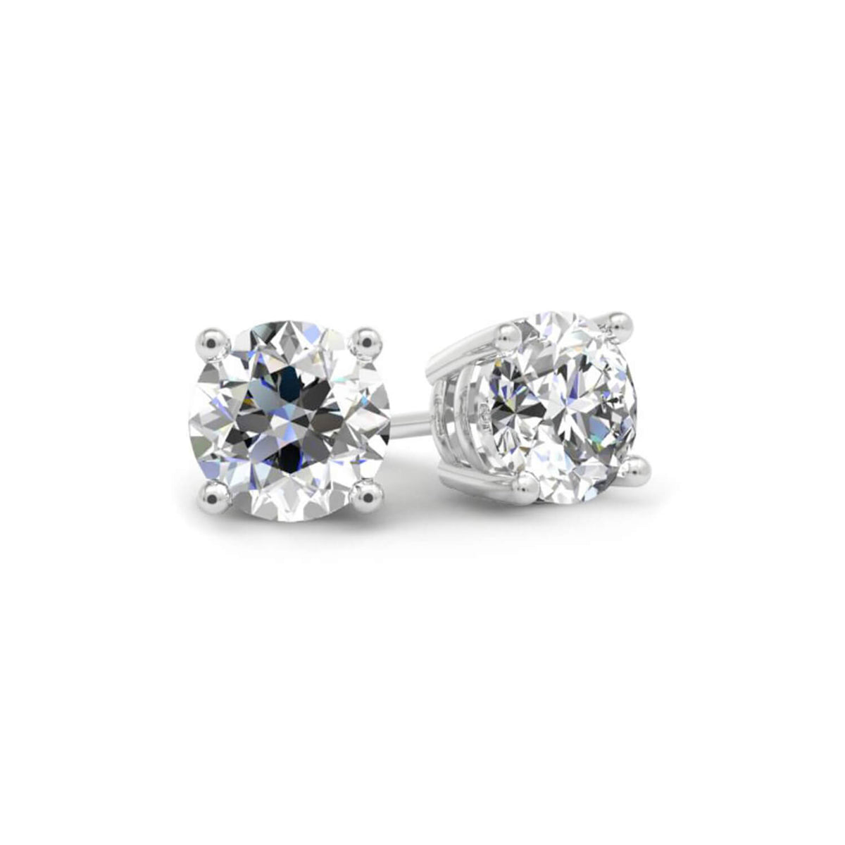Pair of diamond stud earrings on a white background