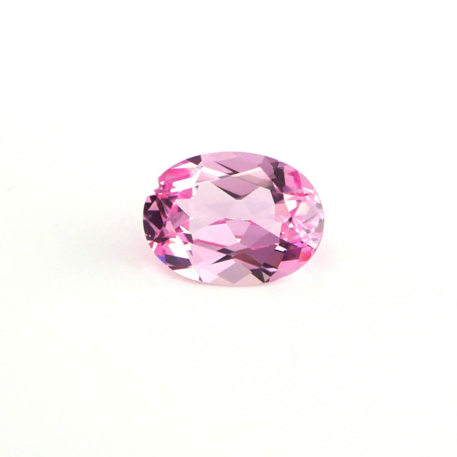 1.35ct 8x6mm Oval Lab Grown Peachy Pink Sapphire