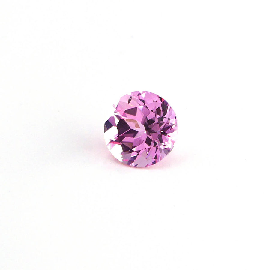 1.70ct 7mm Round Lab Grown Peachy Pink Sapphire