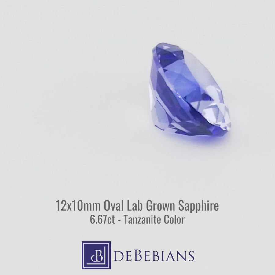 6.67ct 12x10mm Oval Very Light Bluish Purple Color Lab Grown Sapphire