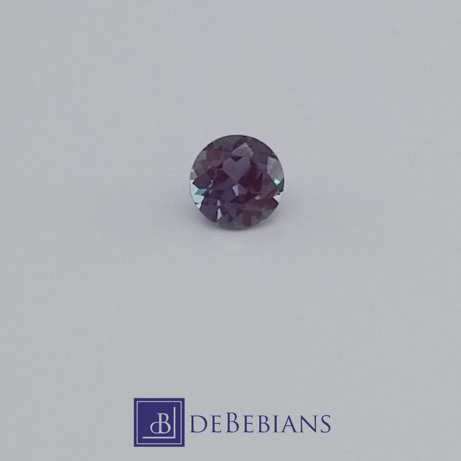 0.97ct 6mm Round Lab Grown Color Changing Alexandrite