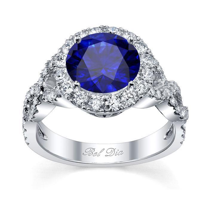 Blue Sapphire Halo with Twisted Shank Sapphire Engagement Rings deBebians 