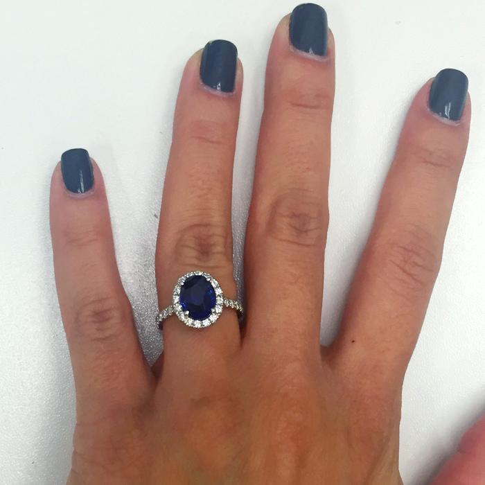 Pave Accented Oval Blue Sapphire Halo Sapphire Engagement Rings deBebians 