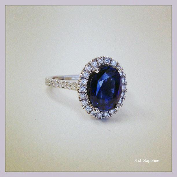 Pave Accented Oval Blue Sapphire Halo Sapphire Engagement Rings deBebians 